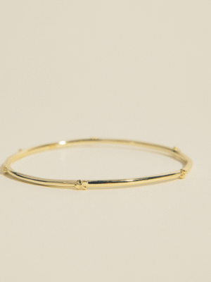 Hyrangea bangle from the coolest mom and female founder. Layer these like it's your job.