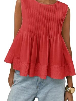 Love the pintucks and slight peplum detail