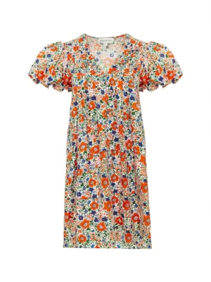 This dress is flattering, easy, and has pockets!