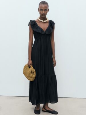 A little drama, a lot of chic. This one does all the work for you.