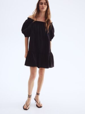 Look at the trim detail above the ruffle: giving quiet luxury.