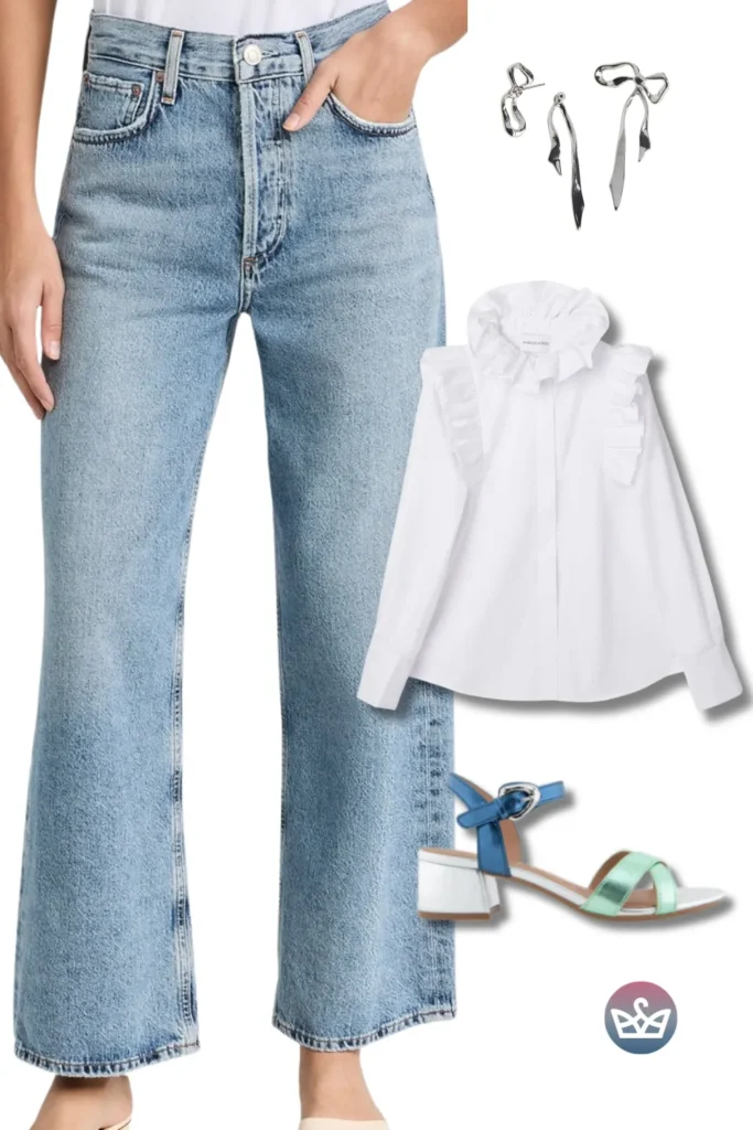 Baggy Jeans with a ruffle-collar white shirt, sculptural silver earrings, and pastel block-heel sandals.