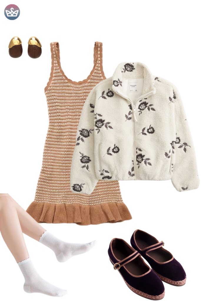 How to style cardigans over summer clothes cardigan outfit ideas that keep you cool and look pulled together 40 adjust my crown A textured outfit featuring a knit mini dress with a tan crocheted top and a ruffled brown hem It's layered with a cream-colored fleece zip-up jacket embroidered with dark floral motifs. The ensemble is grounded by dark purple velvet Mary Jane espadrille flats worn with white ruffled ankle socks, and accessorized with gold and wood tone stud earrings.