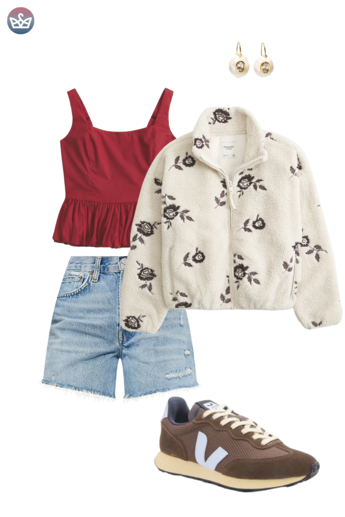 How to style cardigans over summer clothes cardigan outfit ideas that keep you cool and look pulled together 41 adjust my crown A casual layered outfit featuring a red peplum camisole top and light wash denim cutoff shorts It's topped with a cream-colored fleece zip-up jacket embroidered with dark floral motifs. The ensemble is finished with brown and light-blue sneakers and gold drop earrings with a small stone detail.