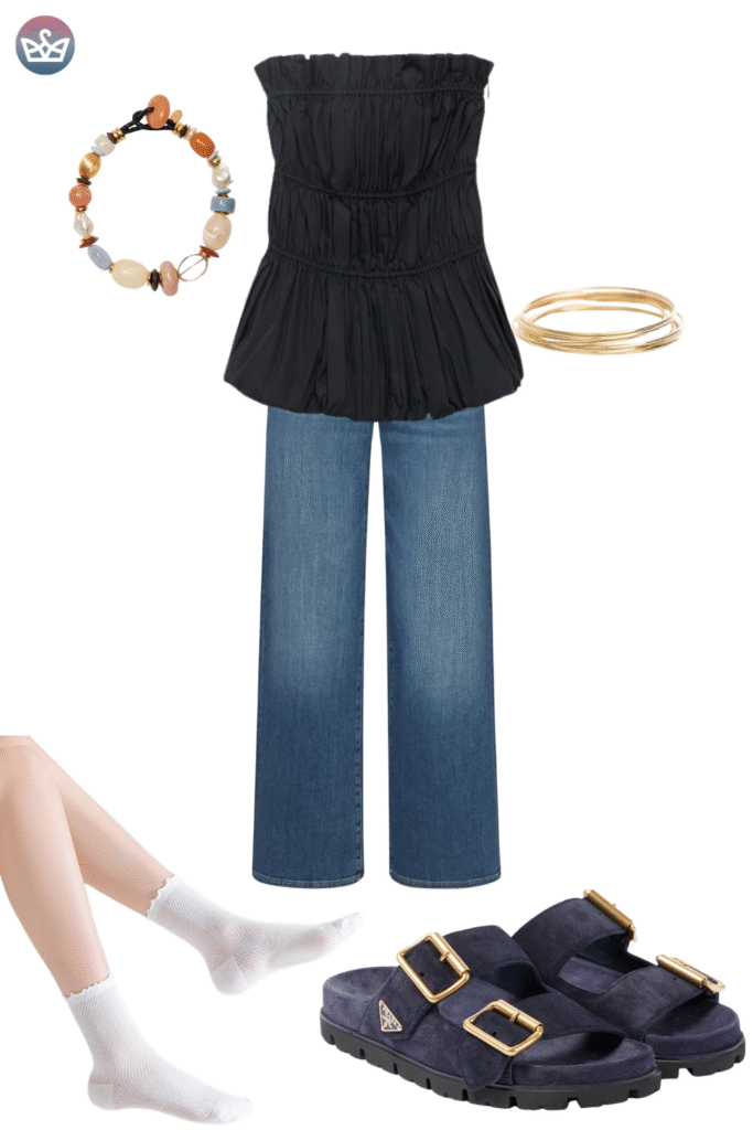 Casual chic fall outfit featuring a black smocked tube top trendy wide leg denim jeans a colorful beaded bracelet and gold bangles The look is grounded by comfortable dark navy suede double strap sandals paired with white ankle socks This ensemble showcases a cool relaxed approach to footwear for mild autumn days
