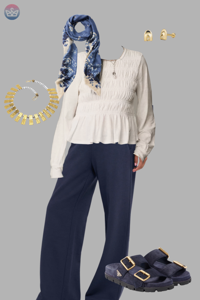 Modern and fresh how to style a white shirt like a pro 5 adjust my crown A comfortable and chic look demonstrating how to style a white shirt a cream ribbed sweater over a white shirt with wide leg navy trousers navy birkenstock style sandals a blue scarf and gold jewelry