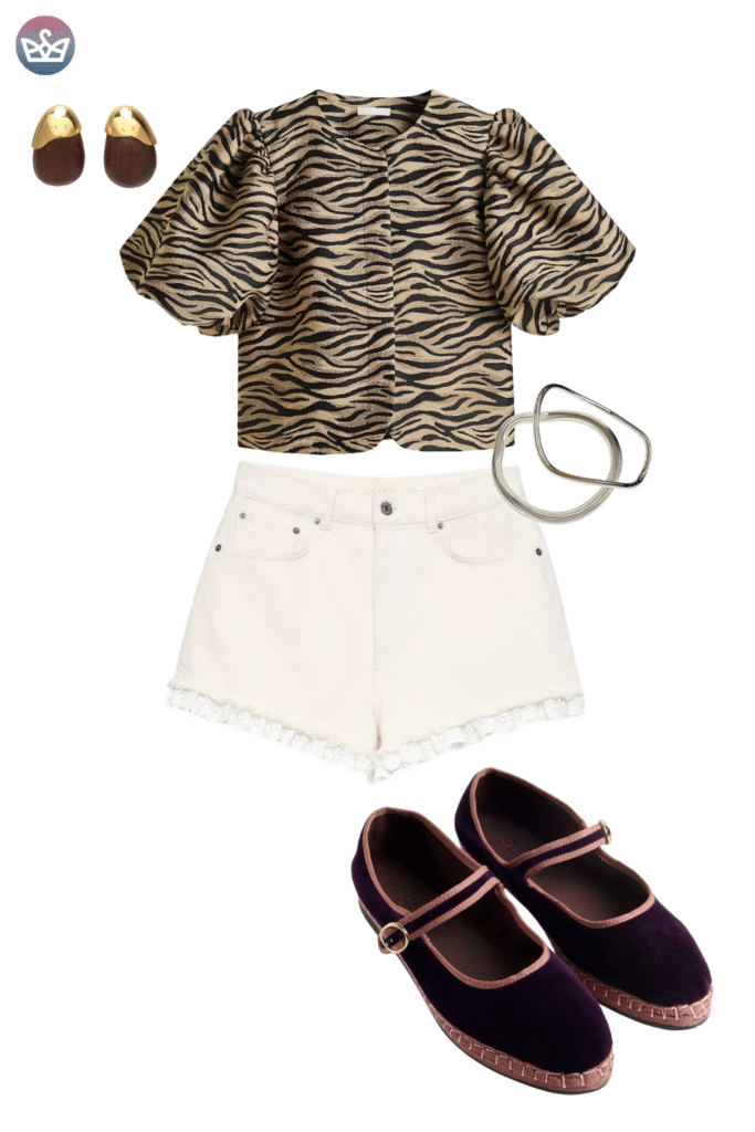 Statement making fall outfit featuring an on trend tiger print puff sleeve crop top high waisted white cutoff shorts with subtle lace trim and gold jewelry The key to this look is the charming dark velvet mary jane flats with rose gold trim proving stylish and comfortable footwear is essential for a fun casual fall look