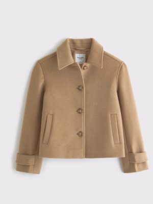 The herringbone adds a little more interest/texture to an outfit than a solid alone would.