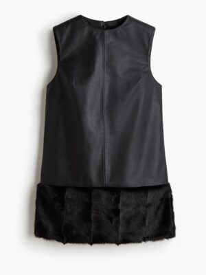 I love that this is a timeless shift silhouette with an edge - the coating that reads like leather and the luxe vibes with the faux fur.