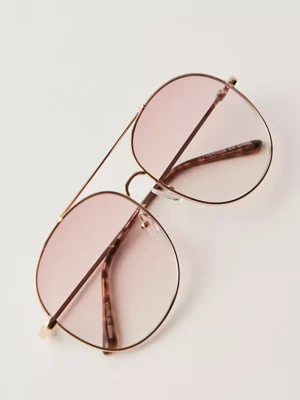 Pasadena Oversized Metal Aviator Sunglasses - they combine the classic oversized aviator style with a trendy, soft pink gradient lens for a chic and statement-making look.