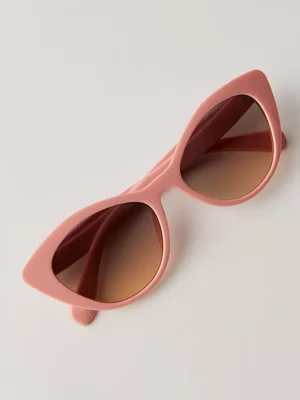 Laurel Cat-Eye Sunglasses. I like their sharp, retro cat-eye design in a soft pink hue makes a bold and fashionable statement accessory.