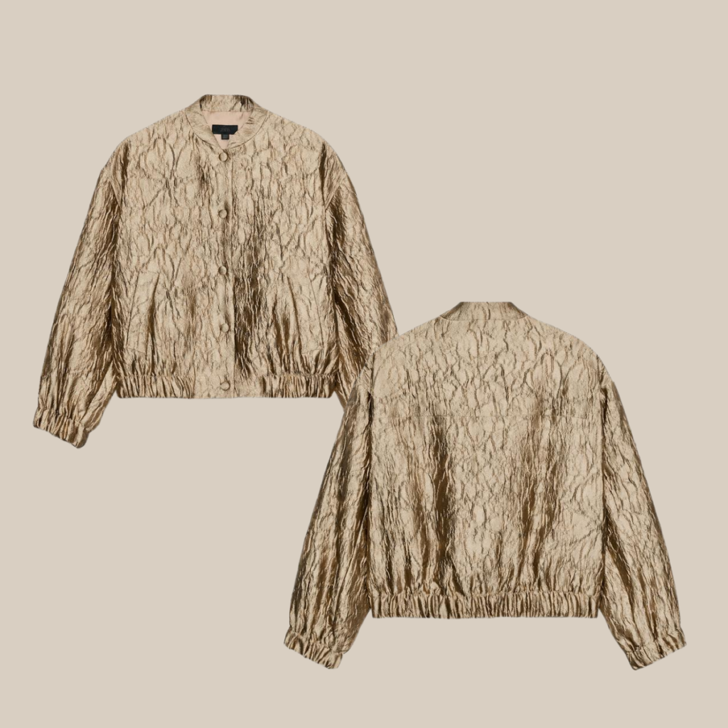 Crinkled metallic gold bomber jacket shown from front and back with elastic hem and cuffs tldr winter work outfits are easier with seven closet staples kick crop pants office shoes in the same color a button down a merino sweater a third piece weatherproof boots and a work tote Pair the pants and shoes in one color then build the top half around a button down and a merino sweater with a  adjust my crown