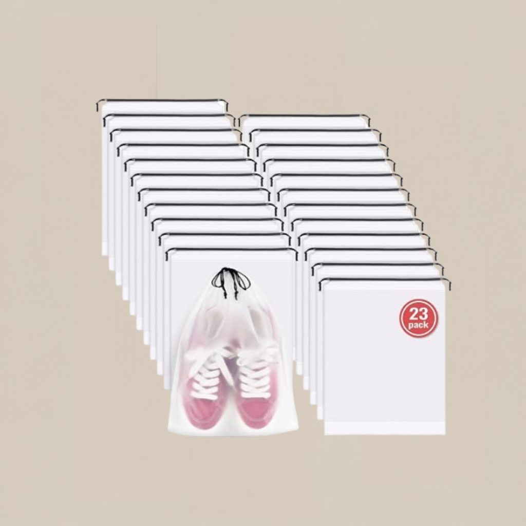Twenty three white drawstring shoe bags arranged in rows with one bag showing pink sneakers Tldr winter work outfits are easier with seven closet staples kick crop pants office shoes in the same color a button down a merino sweater a third piece weatherproof boots and a work tote Pair the pants and shoes in one color then build the top half around a button down and a merino sweater with a  adjust my crown