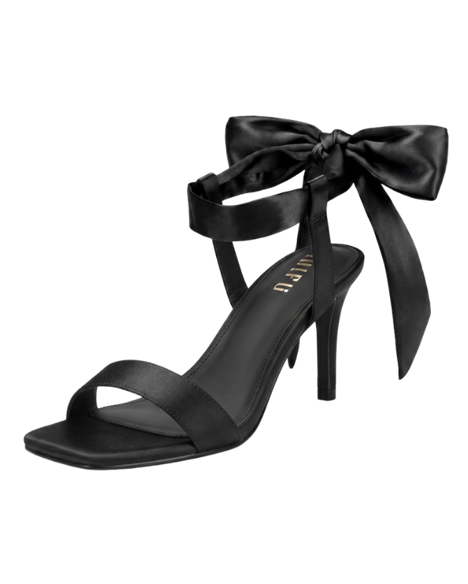 Black satin ankle strap high heel with a large bow at the ankle and an open toe stiletto heel Tldr yes you can repeat a winter wedding guest dress In one poll 71 of adults said they wouldnt notice The more of the same guests the more you change Swap the belt shoes and earrings and top your winter wedding guest outfit with velvet or satin Poll two looks crown the winner and note  adjust my crown